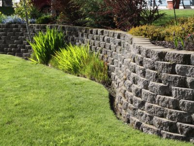 Landscaped Wall Of Cement Cobblestone Bricks