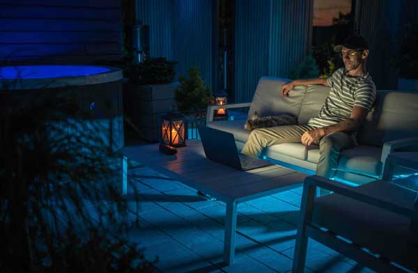 A Man Inside Modern Cool Illuminated Backyard Gard 2025 03 15 21 27 34 Utc Scaled 1